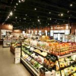 humans shopping at the closest grocery store with fresh produce and daily needs
