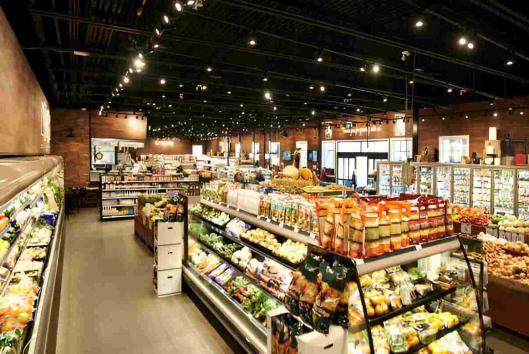 humans shopping at the closest grocery store with fresh produce and daily needs